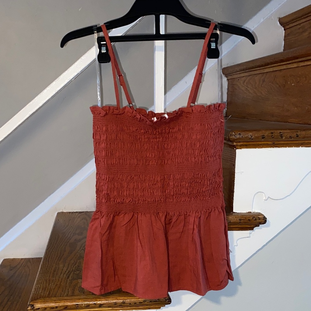 No Boundaries Smocked tank top Brick Red with a peplum hem Size Large